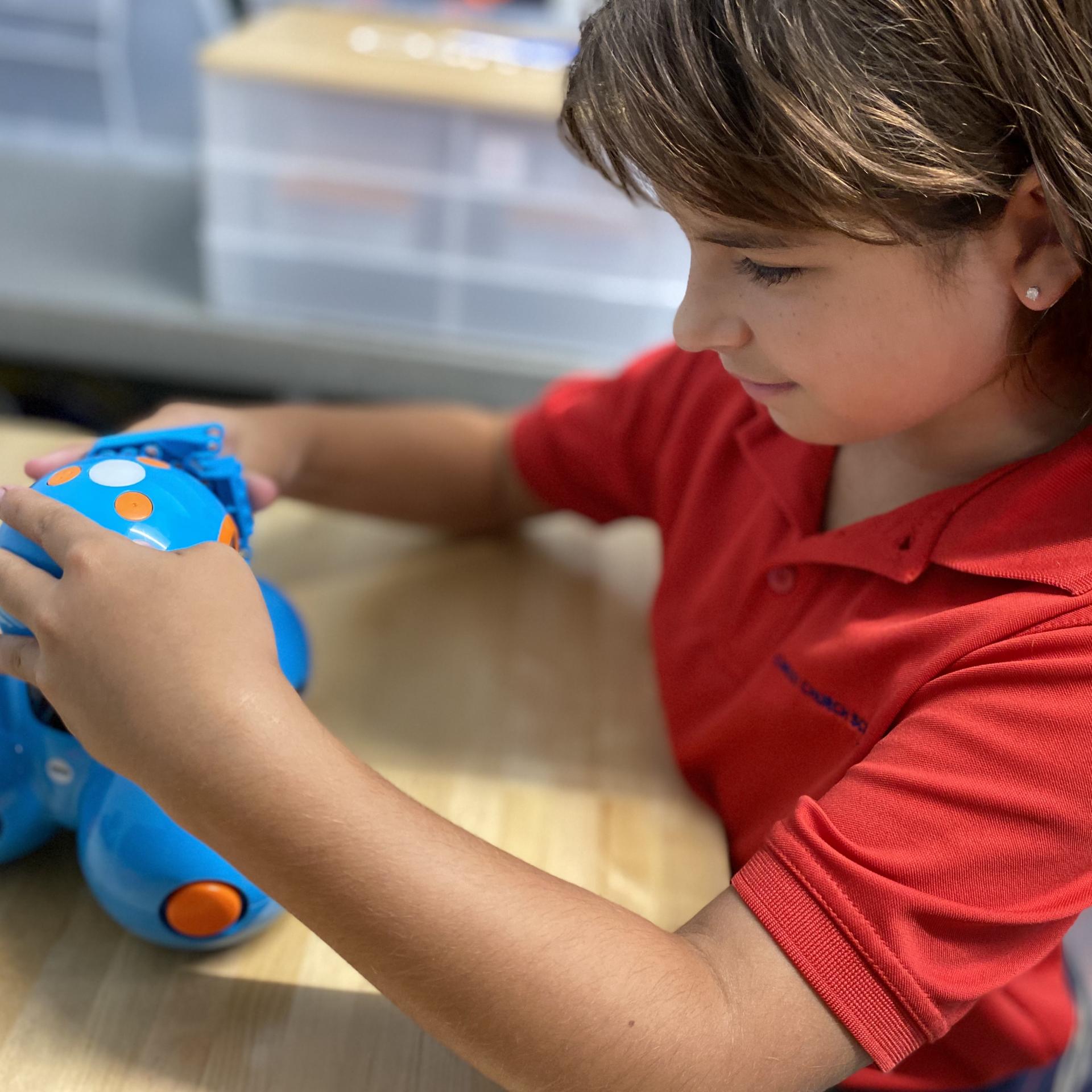 CCS STORIES Redefine Success The little girl loves the iLab. The robots are soooo cool. She thinks she might want to build her own robots someday. She hears classmates across the room disagreeing over who will go first with the 3D printer and her teacher gathers everyone together to ask their ideas for resolving this. More than new technologies, the girl is learning about compromise, empathy, and collaboration. She is learning that real success isn’t about getting ahead of someone else - it’s about getting along with them. It is a profound lesson that will shape her relationships far beyond Christ Church School.